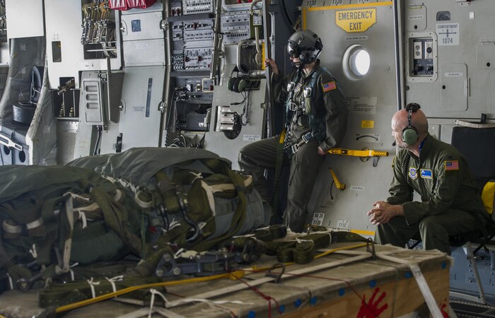 Leon Logothetis, right, TV personality and author of The Kindness Diaries, and Senior Airman Ashley Igalo, left, 14th Airlift Squadron loadmaster, look out the bay door of a C-17 Globmaster III during Logothetis’s visit to Joint Base Charleston, S.C., May 5, 2017. Logothetis said his message of kindness aligns with JB Charleston’s humanitarian missions.