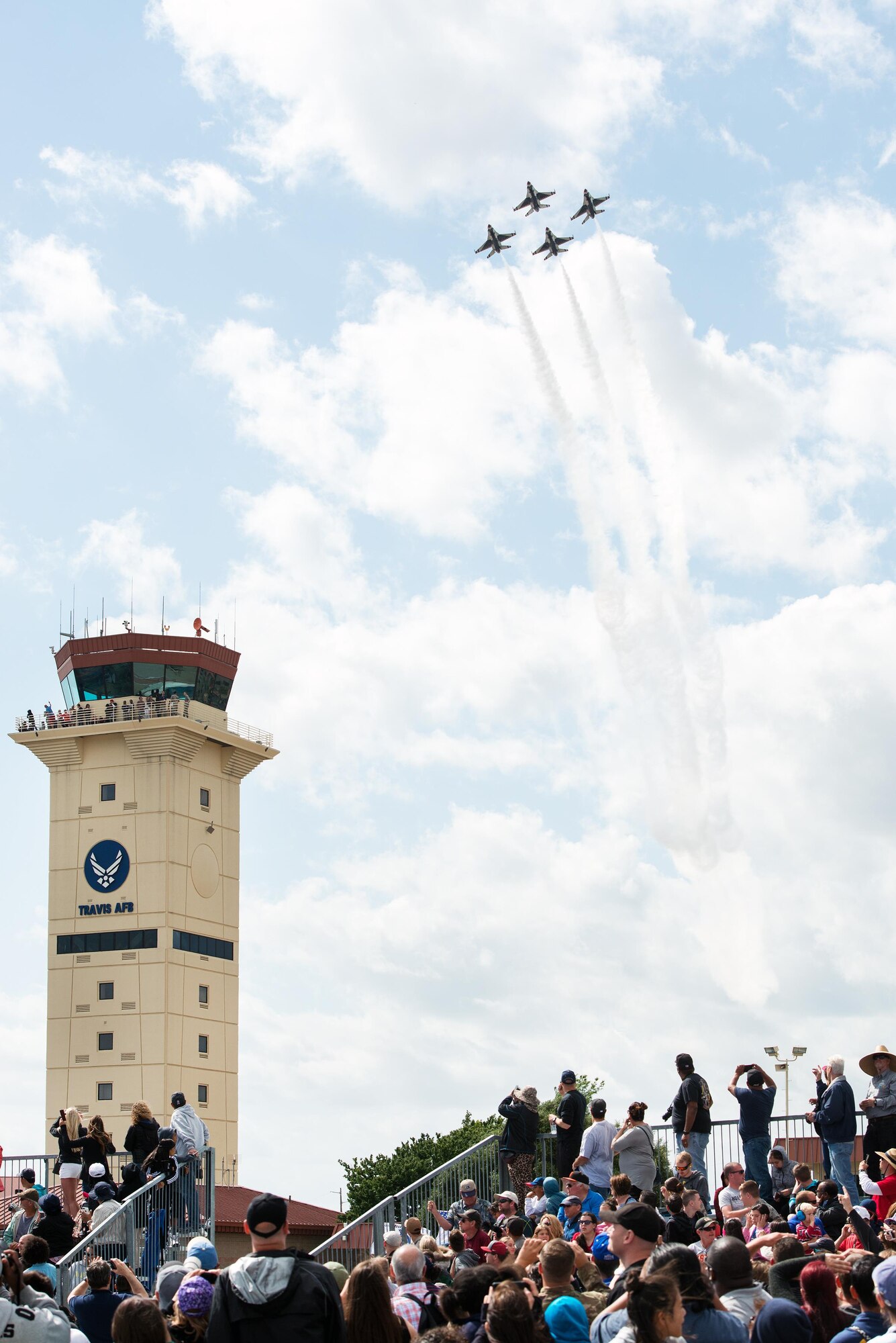 The U.S. Air Force Thunderbirds perform an aerial demonstration during the Wings over Solano Air Show at Travis Air Force Base, Calif., May 6, 2017. The two-day event also featured performances by the U.S. Army Golden Knights parachute team, flyovers and static displays. (U.S. Air Force photo by Louis Briscese)