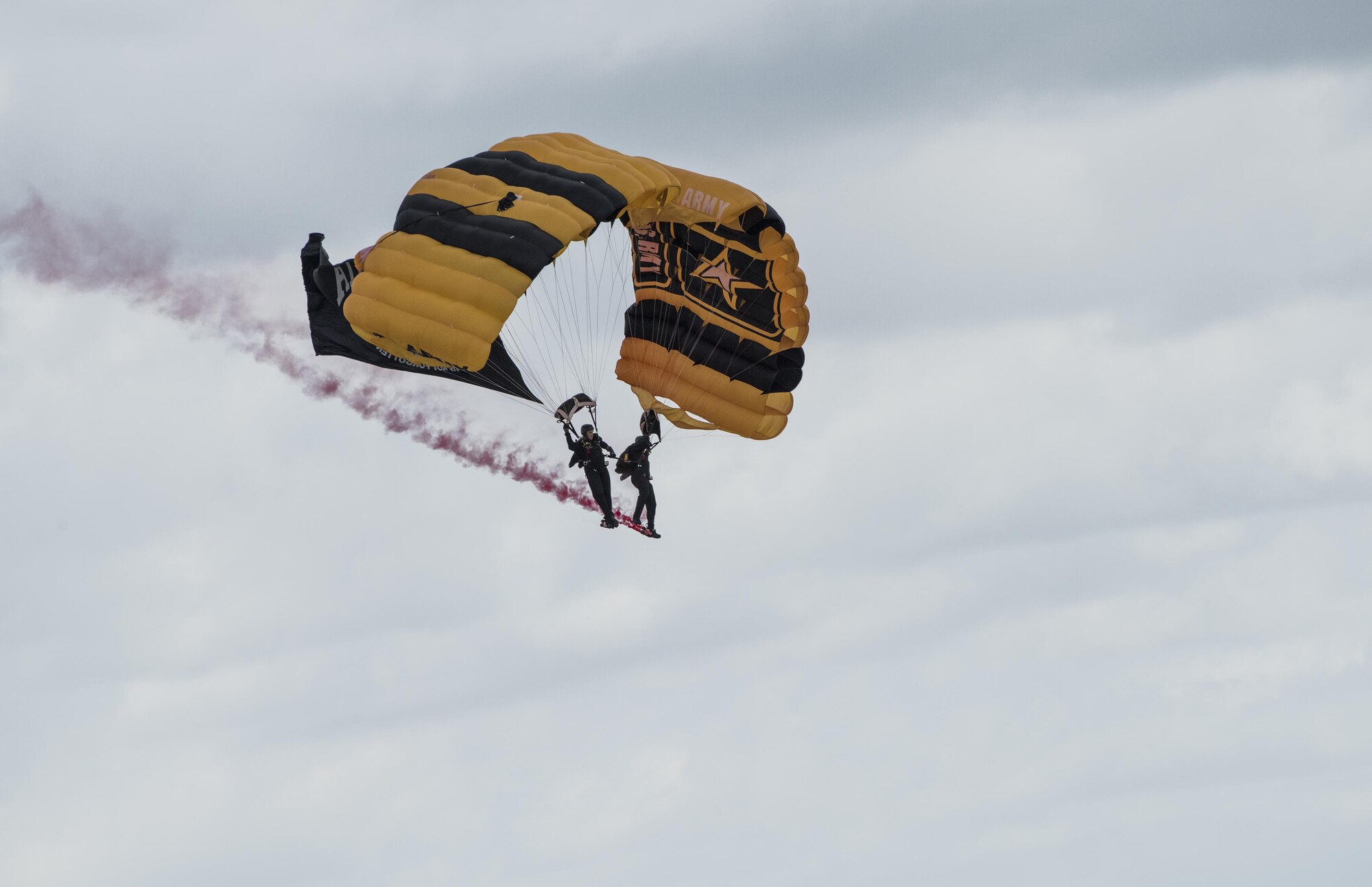 The U.S. Army Golden Knights perform sky diving manuevers during the Wings Over Solano Air Show at Travis Air Force Base, Calif., May 6, 2017. The two-day event also featured performances by the U.S. Air Force Thunderbirds, flyovers and static displays. (U.S. Air Force photo by Heide Couch)