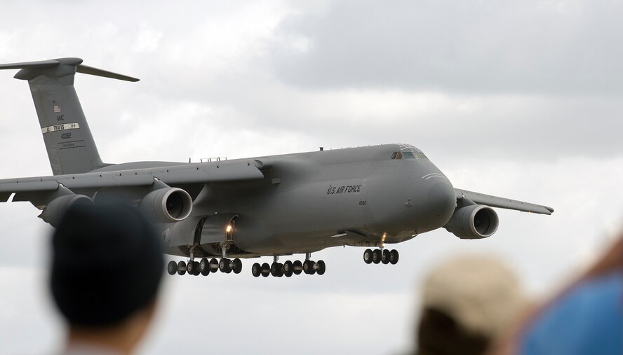 A C-5M Super Galaxy soars in to land at Travis Air Force Base, Calif., May 6, 2017 during the Wings Over Solano Air Show. The two day event featured performances by the U.S. Air Force Thunderbirds, U.S. Air Force Academy Wings of Blue and U.S. Golden Knights parachute teams, as well as civilian acts. (U.S. Air Force  photo/T.C. Perkins Jr.)