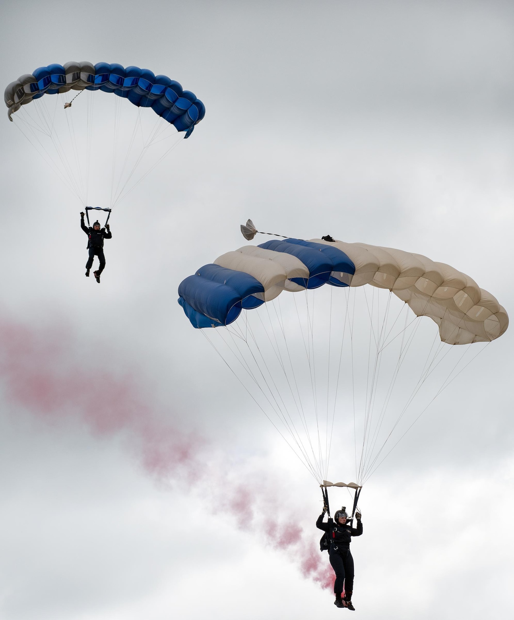 Members of the U.S. Air Force Academy Wings of Blue perform skydiving maneuvers during the Wings Over Solano Air Show at Travis Air Force Base, Calif., May 6, 2017. The two-day event featured performances by the U.S. Air Force Thunderbirds aerial demonstration team, flyovers and static displays. (U.S. Air Force photo by Louis Briscese)