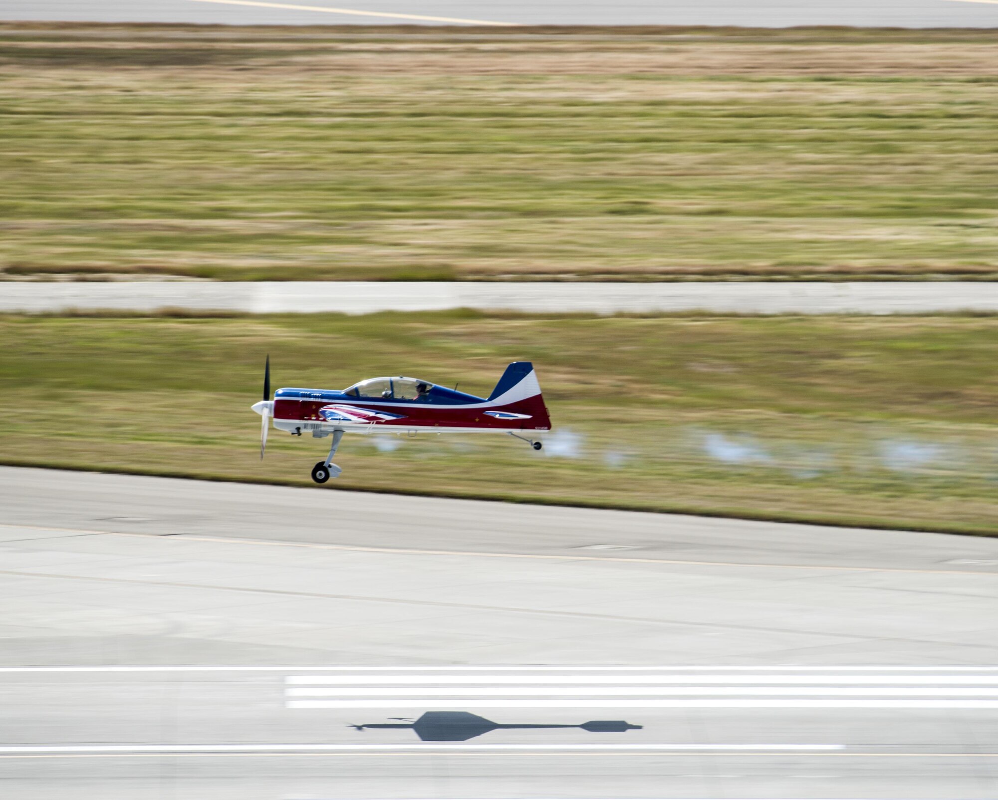 Rich Perkins flys a Russian Thunder YAK-54 during the Wings Over Solano Air Show at Travis Air Force Base, Calif., May 6, 2017. The two-day event featured performances by the United States Air Force Thunderbirds aerial demonstration team, flyovers and static displays. (U.S. Air Force photo by David Cushman)