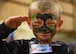 Colin Harrison, a Tyndall Jr. Raptor salutes after getting his face painted at the Tyndall Air Force Base, Fla., Youth Center May 6, 2017. Sixty- three children, ages 5 through 18, participated in the annual Jr. Raptor program where they experienced a deployment out-processing line, learned military formation movements and exercises during the event. (U.S. Air Force photo by Senior Airman Sergio A. Gamboa/Released)