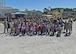 Tyndall Jr. Raptor participants and volunteers pose for a group photo at the Tyndall Air Force Base, Fla., Silver Flag site May 6, 2017. The annual Jr. Raptor program benefits military children by providing educational and hands-on activities on what their parents do to support the Tyndall mission. (U.S. Air Force photo by Senior Airman Sergio A. Gamboa/Released)