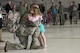 Senior Airman Kevin Isaac from the Colorado Air National Guard’s 140th Aircraft Maintenance Squadron, says goodbye to his daughter Alysaa before he departs from Buckley AFB, Colo., May 5, 2017. Approximately 250 Airmen from the Colorado Air National Guard’s 140th Wing along with 12 F-16 Fighting Falcons are departing to Kadena Air Base, Japan for a deployment in support of the U.S. Pacific Command Theater Security Package.   (U.S. Air National Guard photo by Master Sgt. Wolfram M. Stumpf/Released)