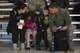 Senior Airman Aaron Romero from the Colorado Air National Guard’s 140th Maintenance Group, spends time with his family before he departs from Buckley AFB, Colo., May 5, 2017. Approximately 250 Airmen from the Colorado Air National Guard’s 140th Wing along with 12 F-16 Fighting Falcons are departing to Kadena Air Base, Japan for a deployment in support of the U.S. Pacific Command Theater Security Package.   (U.S. Air National Guard photo by Master Sgt. Wolfram M. Stumpf/Released)