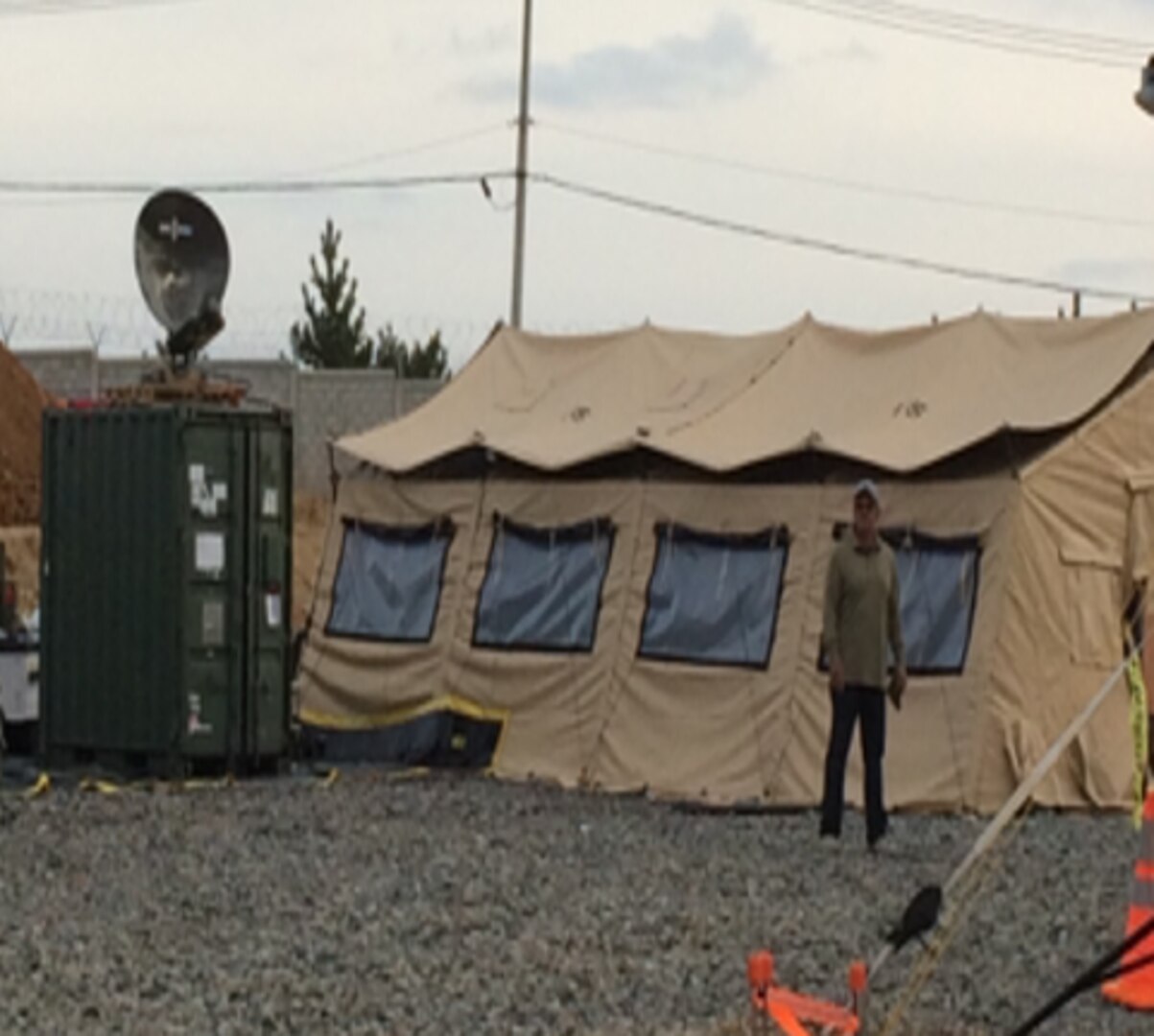 Expeditionary J6 team member Ed Garibay monitors satellite uplink to ensure the Expeditionary Team stays connected.