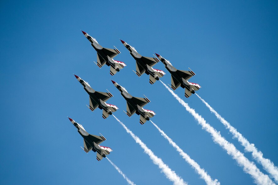 The U.S. Air Force Thunderbirds perform an aerial demonstration during the Wings over Solano Air Show at Travis Air Force Base, Calif., May 7, 2017. The two-day event also featured performances by the U.S. Army Golden Knights parachute team, flyovers and static displays. (U.S. Air Force photo by Louis Briscese)