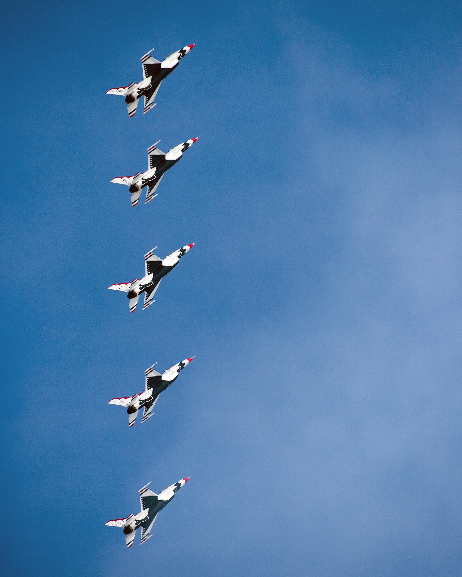 The U.S. Air Force Thunderbirds perform an aerial demonstration during the Wings over Solano Air Show at Travis Air Force Base, Calif., May 7, 2017. The two-day event also featured performances by the U.S. Army Golden Knights parachute team, flyovers and static displays. (U.S. Air Force photo by Louis Briscese)