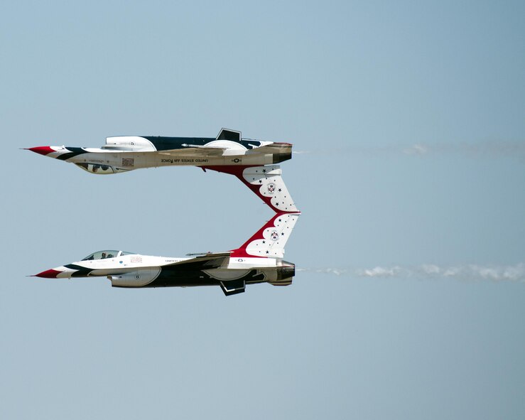 The U.S. Air Force Thunderbirds perform an aerial demonstration during the Wings over Solano Air Show at Travis Air Force Base, Calif., May 7, 2017. The two-day event also featured performances by the U.S. Army Golden Knights parachute team, flyovers and static displays. (U.S. Air Force photo by Louis Briscese)