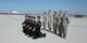 Members of the U.S. Air Force Thunderbirds pose for a photo with Airmen from Travis Air Force Base, Calif., during the Wings Over Solano Air Show at Travis May 7, 2017. The two day event featured performances by the Thunderbirds, U.S. Army Golden Knights parachute team, flyovers and static displays. (U.S. Air Force  photo/T.C. Perkins Jr.)