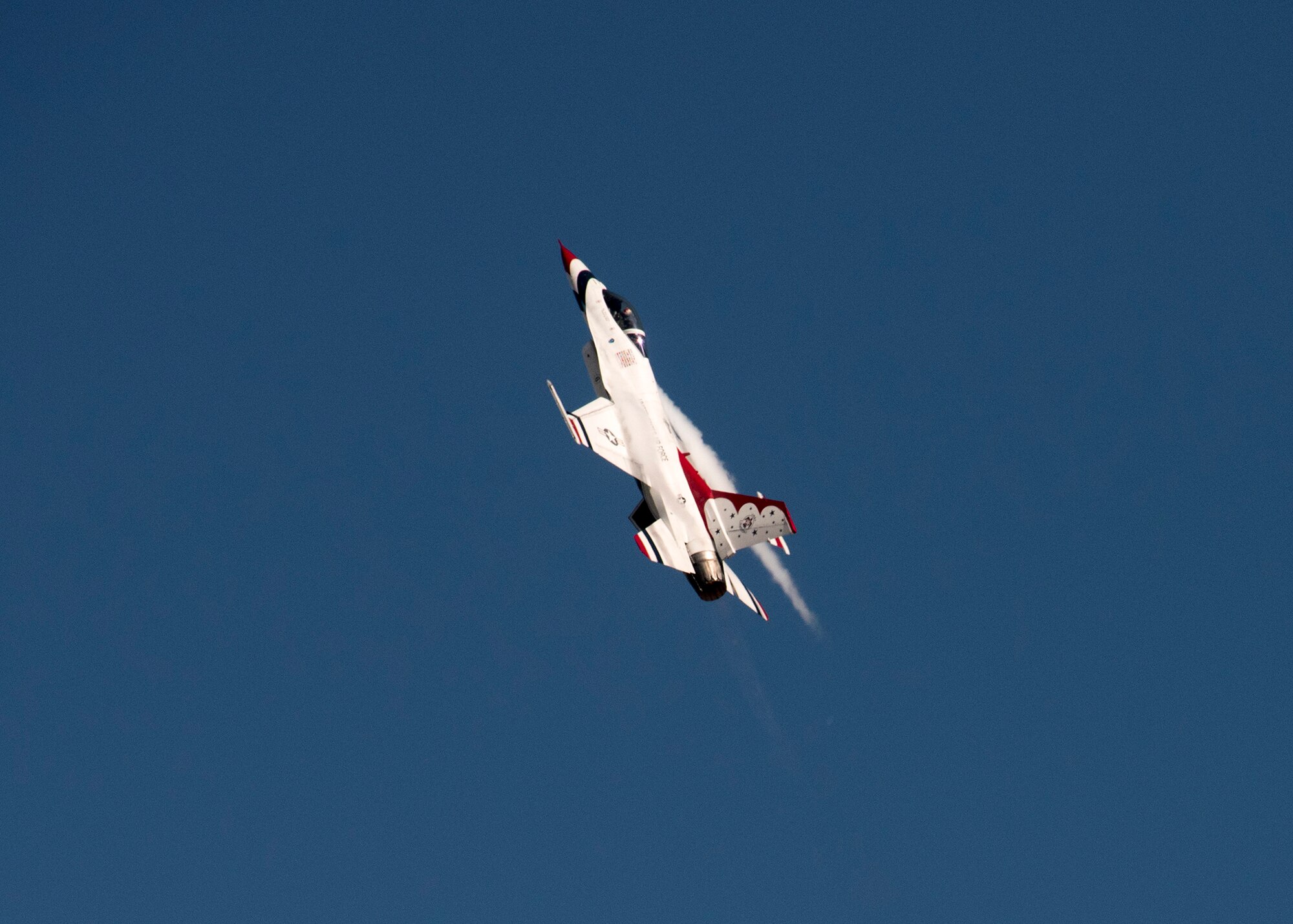 The U.S. Air Force Thunderbirds perform an aerial demonstration during the Wings over Solano Air Show at Travis Air Force Base, Calif., May 7, 2017. The two-day event also featured performances by the U.S. Army Golden Knights parachute team, flyovers and static displays. (U.S. Air Force  photo/T.C. Perkins Jr.)