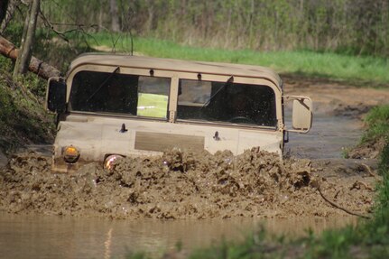 FORT MCCOY, Wisconsin--Medical personnel from the 7456th Medical Backfill Battalion based in Des Moines, Iowa, ford a water obstacle during driver’s training at the Wheeled Vehicle Driving Course at Fort McCoy during Warrior Exercise 86-17-02 on May 6, 2017.  The 7456th MBB trained and licensed personnel in order to better support operations in austere environments. The demonstrated leadership, energy and execution of our Soldiers will ensure. America’s Army Reserve remains the most capable, combat-ready, and lethal federal reserve force in the history of the Nation. (Photo by Maj. A. Sean Taylor, 7456 MBB)