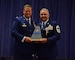 From left, Lt. Col. Lynn Robinson, commander, 166th MXG, presents the 166th Airlift Wing tail-flash to Chief Master Sgt. Henry J. Rome, 166th MXG Superintendent, for over 36 years of military service with the Delaware Air National Guard, the United States Air Force Reserve, the United States Air Force and to the United States of America at the Delaware Air National Guard Base, New Castle, Del., 6 May 2017. (U.S. Air National Guard photo by SSgt. Andrew Horgan/released)