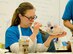 Staff Sgt. Abigail Paisley, 436th Force Support Squadron, puts the final touches of paint on her piggy bank May 5, 2017, at the Arts & Crafts Center on Dover Air Force Base, Del. Paisley was one of many Team Dover members that participated in the “Painting on Pottery” class, one of many classes offered during Dover AFB’s Wingman University. (U.S. Air Force photo by Roland Balik)