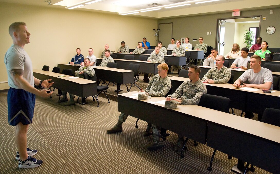 Senior Master Sgt. Jason Barnshaw, 436th Force Support Squadron Airman Leadership School commandant, speaks to Team Dover members attending Dover’s Wingman University “Fundamental but Unteachable Laws of Leadership” class May 5, 2017, at the ALS auditorium on Dover Air Force Base, Del. This class was one of more than 90 classes and events held during Wingman Day. (U.S. Air Force photo by Roland Balik)