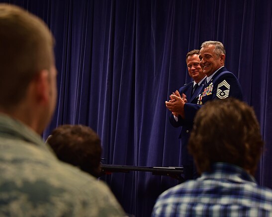 Chief Master Sgt. Henry J. Rome, 166th MXG Superintendent, receives a standing ovation during his retirement ceremony at the Delaware Air National Guard Base, New Castle, Del., 6 May 2017. Chief Master Sgt. Rome retired with over 36 years of military service with the Delaware Air National Guard, the United States Air Force Reserve, the United States Air Force and to the United States of America. (U.S. Air National Guard photo by SSgt. Andrew Horgan/released)