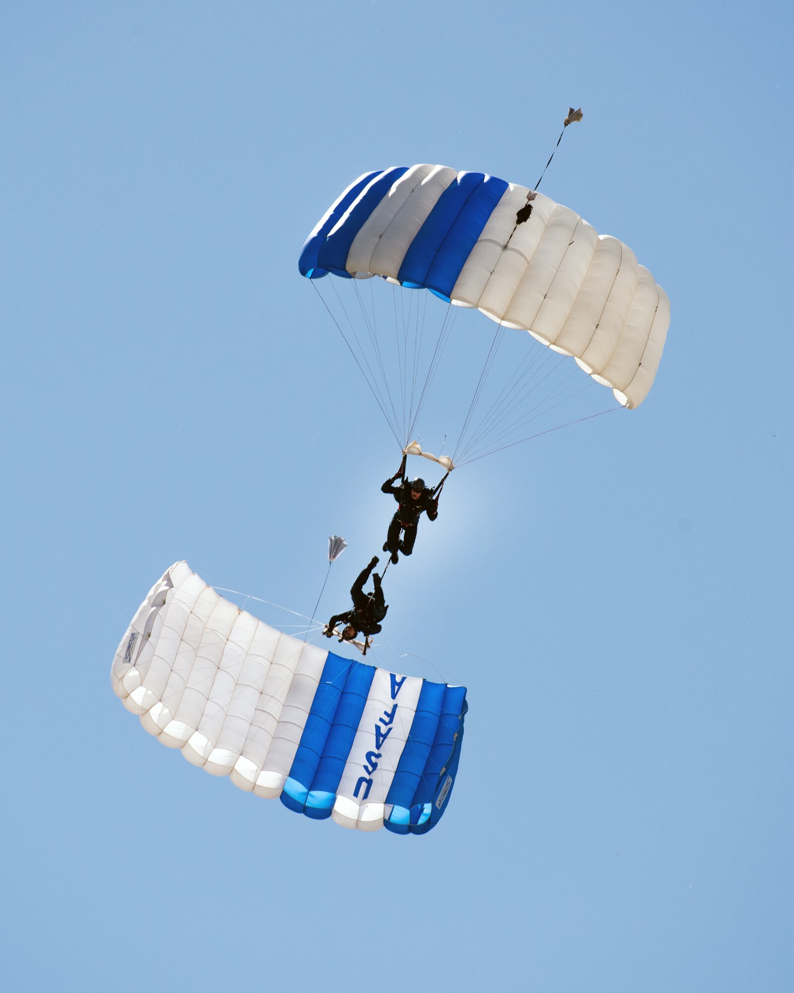 The U.S. Air Force Academy Wings of Blue parachute team perform skydiving maneuvers during the Wings Over Solano Air Show at Travis Air Force Base, Calif., May 7, 2017. The two-day event also featured performances by the U.S. Air Force Thunderbirds Aerial Demonstration Team, flyovers and static displays. (U.S. Air Force photo by Louis Briscese)