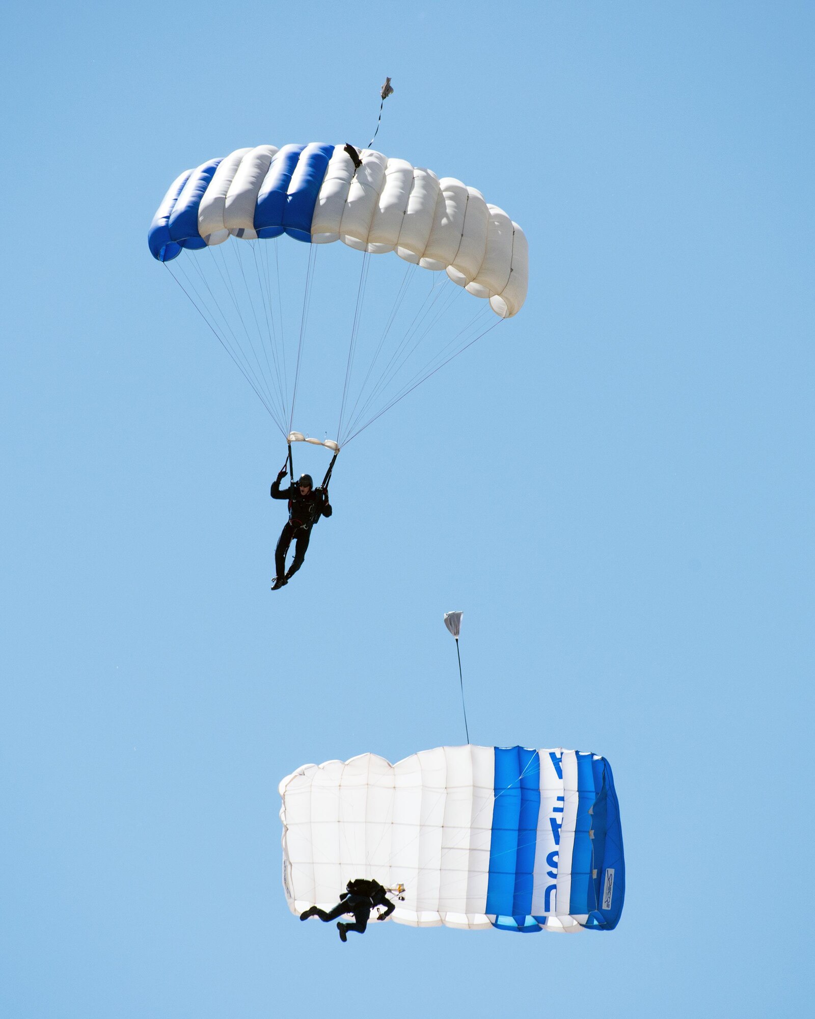 The U.S. Air Force Academy Wings of Blue parachute team perform skydiving maneuvers during the Wings Over Solano Air Show at Travis Air Force Base, Calif., May 7, 2017. The two-day event also featured performances by the U.S. Air Force Thunderbirds Aerial Demonstration Team, flyovers and static displays. (U.S. Air Force photo by Louis Briscese)
