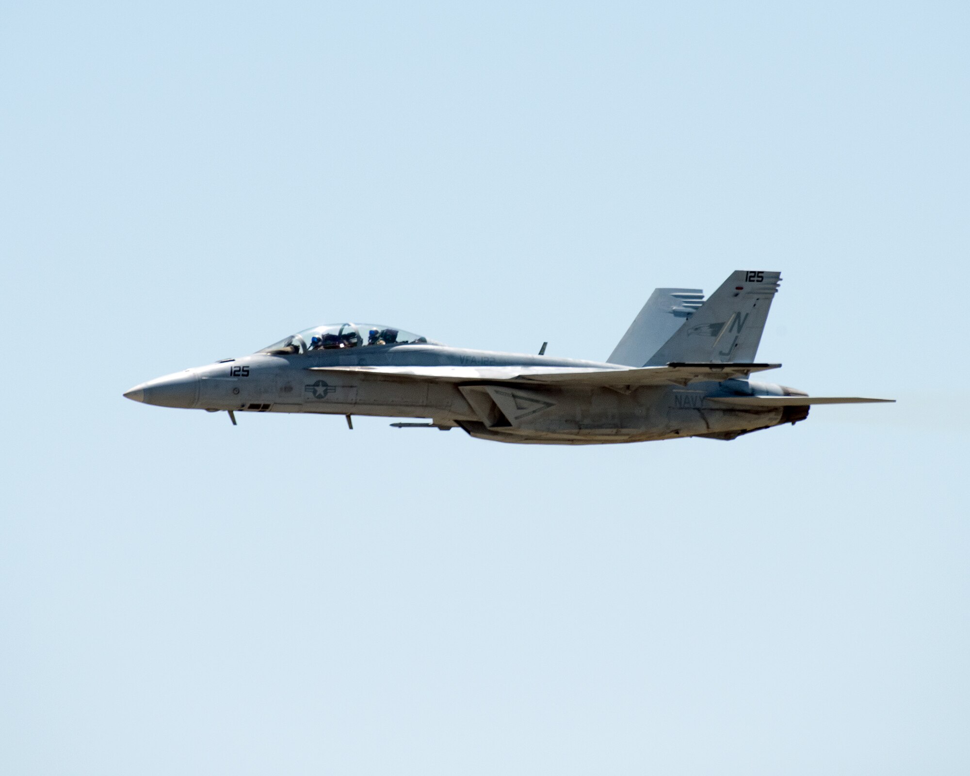An F-18 Super Hornet performs an aerial demonstration during the Wings over Solano Air Show at Travis Air Force Base, Calif., May 7, 2017. The two-day event was attended by over 50,000 patrons and also featured a performance by the U.S. Army Golden Knights parachute team, flyovers and static displays. (U.S. Air Force photo by Louis Briscese)