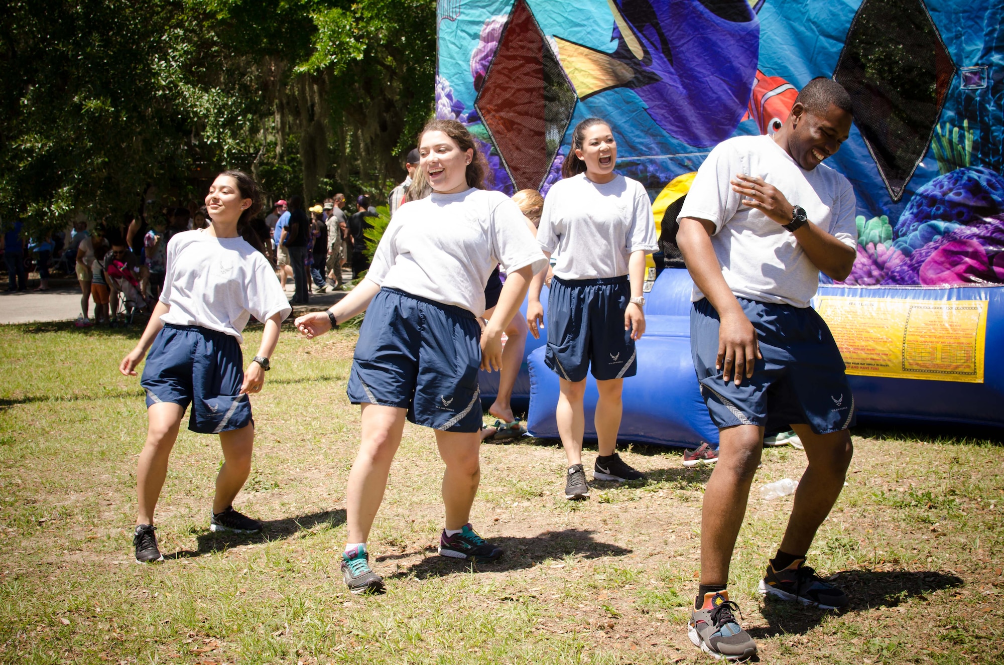 Airmen assigned to the 81st Training Wing dance while volunteering at the 403rd Wing Airman and Family Day picnic May 6, 2017 at Keesler Air Force Base, Mississippi. (U.S. Air Force photo/Staff Sgt. Heather Heiney)