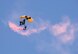 A member of the U.S. Army Golden Knights parachute team perform skydiving maneuvers during the Wings Over Solano Air Show at Travis Air Force Base, Calif., May 7, 2017. The two-day event featured performances by the U.S. Air Force Thunderbirds aerial demonstration team, flyovers and static displays. (U.S. Air Force photo by Heide Couch)