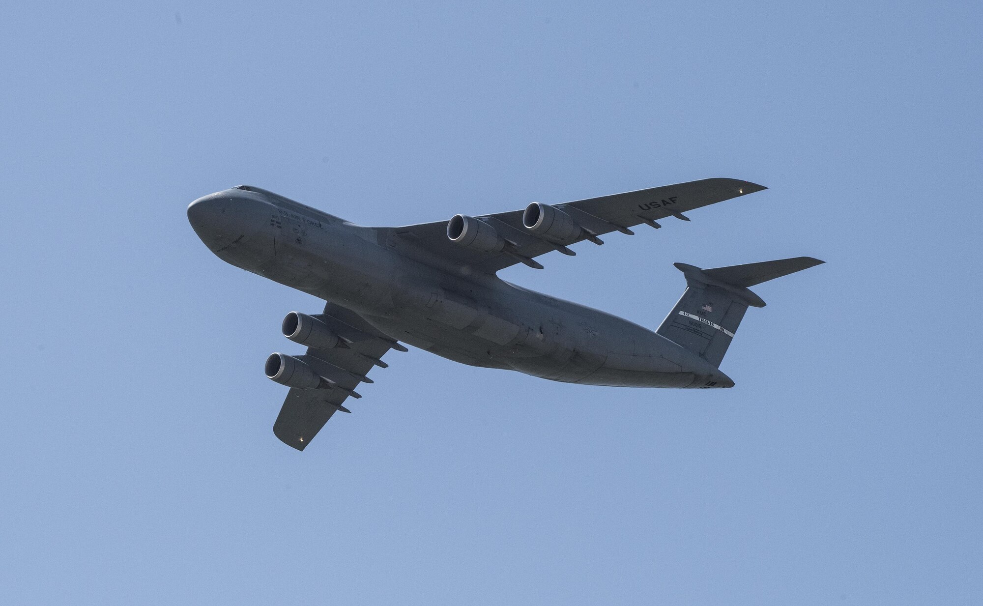 A C-5M Super Galaxy soars over Travis Air Force Base, Calif., May 7, 2017 during the Wings Over Solano Air Show. The two day event featured performances by the U.S. Air Force Thunderbirds, U.S. Air Force Academy Wings of Blue and U.S. Army Golden Knights parachute teams, as well as civilian acts.
(U.S. Air Force photo by Heide Couch)