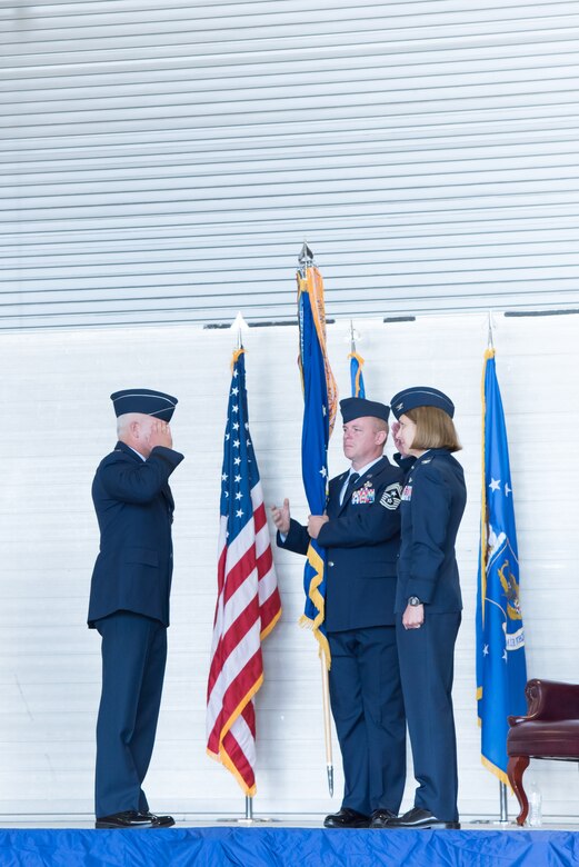 Maj. Gen. John P. Stokes, 22nd Air Force commander, returns a salute from Col. Jennie R. Johnson, incoming 403rd Wing commander, during the 403rd Wing change of command ceremony May 7, 2017 at Keesler Air Force Base, Mississippi. (U.S. Air Force photo/Staff Sgt. Heather Heiney)