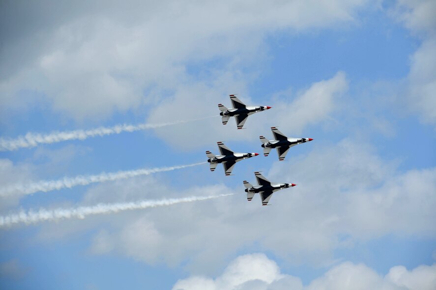 The U.S. Air Force Thunderbirds fly in formation above the 2017 Wings over Solano air show May 6, 2017 at Travis Air Force Base, Calif. The Thunderbirds concluded the air show with a high-speed maneuver demonstration. ( U.S. Air Force photo/Airman 1st Class James Thompson)