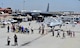Spectators gather around the MQ-9 Reaper model May 7, 2017, at Travis Air Force Base, Calif., during the Wings Over Solano air show. During the show, pilots, sensor operators and intelligence Airmen showcased how they accomplish their mission day in and day out. *U.S. Air Force photo/Senior Airman Christian Clausen)