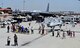 Spectators gather around the MQ-9 Reaper model May 7, 2017, at Travis Air Force Base, Calif., during the Wings Over Solano air show. During the show, pilots, sensor operators and intelligence Airmen showcased how they accomplish their mission day in and day out. *U.S. Air Force photo/Senior Airman Christian Clausen)