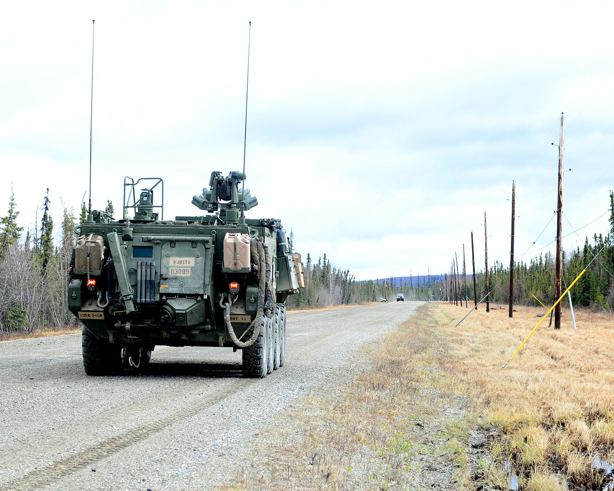 A U.S. Army M1135 Nuclear, Biological, Chemical Reconnaissance Vehicle, from the 1st Stryker Brigade Combat Team out of Fort Wainwright, Alaska, drives down a road during Operation Merlin Wing, May 5, 2017, at Eielson Air Force Base, Alaska. Operation Merlin Wing was a joint exercise between Air Force and Army chemical, biological, radiological and nuclear defense units, which also incorporated Air Force explosive ordnance disposal teams. (U.S. Air Force photo by Airman Eric M. Fisher)