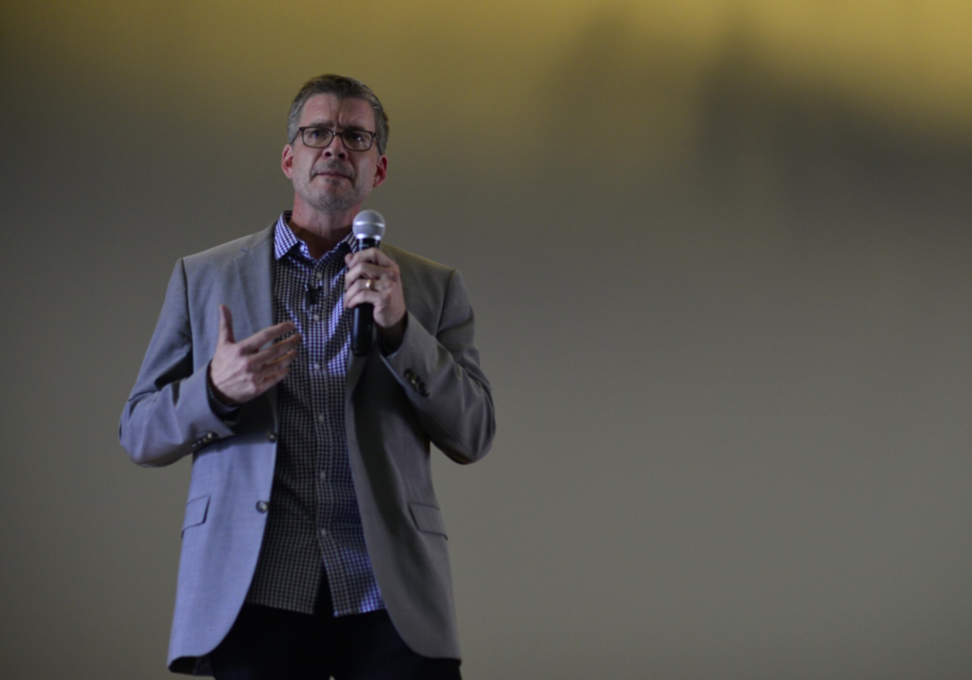 Chris Henry Coffee, Theater of War actor and facilitator, introduces Team Osan members to the Greek play “Ajax” at Osan Air Base, Republic of Korea, May 5, 2017. Written by playwright and general Sophocles, “Ajax” tells the story of a great war hero struggling with stress, family, honor and suicide. During Theater of War, three actors perform two pivotal scenes from the play and relate them to situations modern military members still deal with today. (U.S. Air Force photo by Staff Sgt. Alex Fox Echols III)