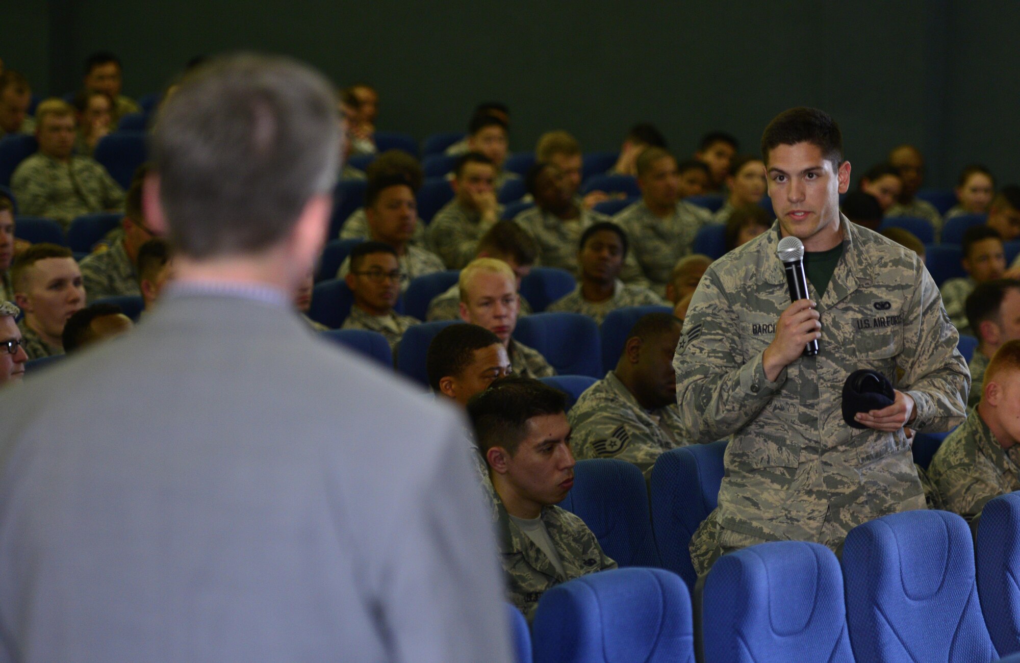 U.S. Air Force Senior Airman Pablo Barcia, Theater of War attendee, discusses the play “Ajax” after a live presentation at Osan Air Base, Republic of Korea, May 5, 2017. During Theater of War, actors Chris Henry Coffee, Reg E. Cathey, and Linda Powell presented two of the plays pivotal scenes live to show Ajax’s struggles with stress, family, honor and suicide. (U.S. Air Force photo by Staff Sgt. Alex Fox Echols III)