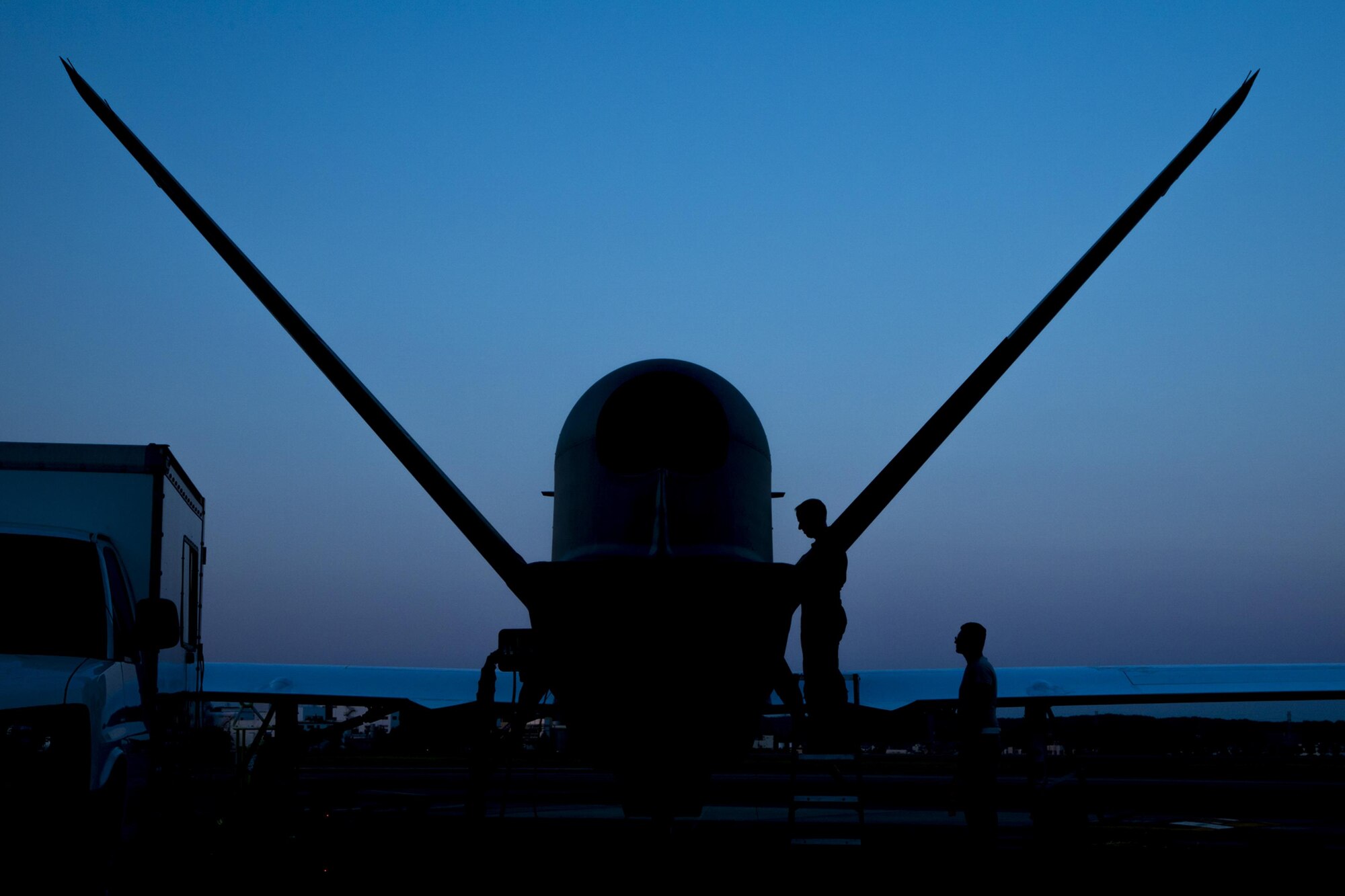 Capt. Mark, 69th Reconnaissance Group Detachment 1, performs preflight checks on an RQ-4 Global Hawk for its first take off from Yokota Air Base, Japan, May 5, 2017. The Global Hawk is temporally deployed to Yokota from Andersen Air Force Base, Guam to support U.S. intelligence, surveillance, and reconnaissance priorities, operational plans and contingency operations throughout the Pacific theater. (U.S. Air Force photo by Airman 1st Class Donald Hudson)