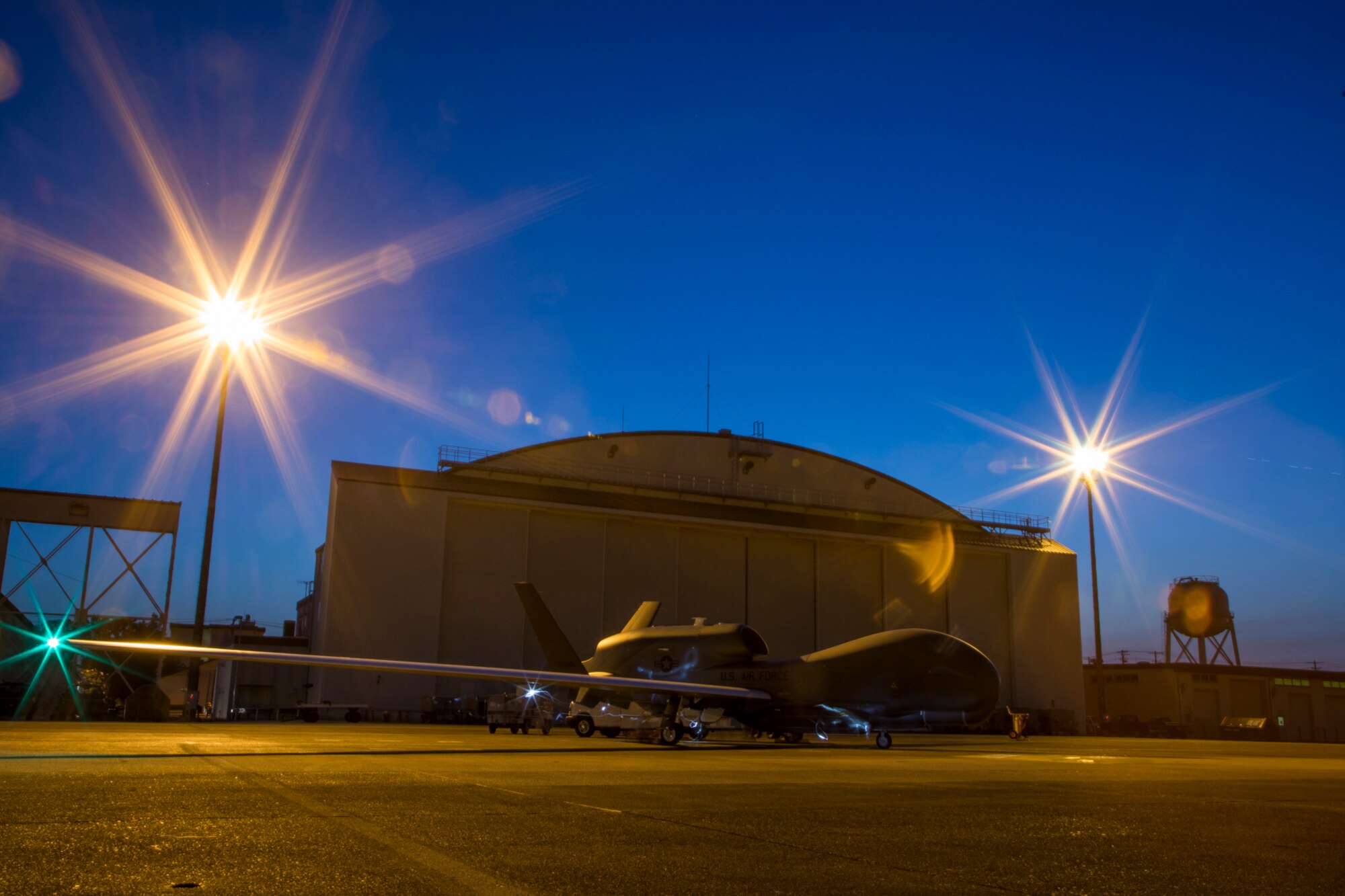 Airmen with the 69th Reconnaissance Group Detachment 1, prepares an RQ-4 Global Hawk for its first take off from Yokota Air Base Japan, May 5, 2017. The Global Hawk was used for humanitarian assistance and disaster relief efforts during Operation Tomoadachi, when a 9.0-magnitude earthquake resulted in a tsunami ravaging northeastern Japan in 2011. (U.S. Air Force photo by Airman 1st Class Donald Hudson)