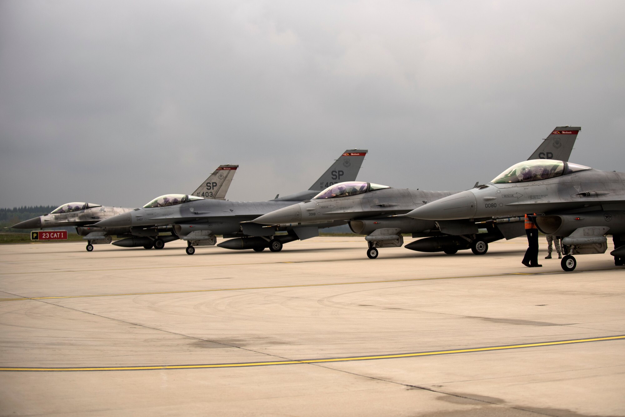 U.S. Air Force F-16 Fighting Falcons assigned to the 480th Fighter Squadron wait for inspections during a "14 front" launch at Spangdahlem Air Base, Germany, May 4th, 2017. From April 24 to May 5, the 480th FS and 52nd Aircraft Maintenance Squadron supported 26 sorties a day, 14 in the morning and 12 in the afternoon. This flying tempo is referred to as a, “14 turn 12,” and is a 16 percent increase over normal operations. During normal operations, it’s standard to launch a 12 turn 10, or 4 fewer sorties per day. Preparing and launching 14 aircraft in one go is referred to as a “14 front.” (U.S. Air Force photo by Preston Cherry)