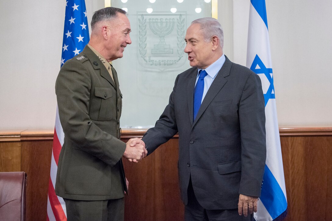Marine Corps Gen. Joe Dunford, chairman of the Joint Chiefs of Staff, shakes hands with Israeli Prime Minister Benjamin Netanyah during a meeting in Jerusalem, May 9, 2017. DoD photo by Navy Petty Officer 2nd Class Dominique A. Pineiro