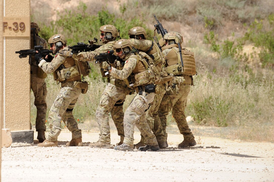 AMMAN, Jordan (May 8, 2017) Italian Airmen assigned to the 17th Special Operations Wing, participating in small unit tactics, prepare to clear a building during drill at the King Abdullah II Special Operations Training Center, as part of Exercise Eager Lion. Eager Lion is an annual U.S. Central Command exercise in Jordan designed to strengthen military-to-military relationships between the U.S., Jordan and other international partners. This year's iteration is comprised of about 7,200 military personnel from more than 20 nations that will respond to scenarios involving border security, command and control, cyber defense and battlespace management. (U.S. Navy photo by Mass Communication Specialist 1st Class Matthew Cole/Released) 170508-N-ER662-006