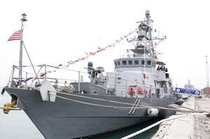 The Cyclone-class coastal patrol ship (PC) USS Whirlwind (PC 11) is moored pier side at Naval Support Activity Bahrain during the ship's change of command ceremony. The primary mission of the PCs is maritime security operations, and Whirlwind is one of 10 PCs forward deployed to Manama, Bahrain.