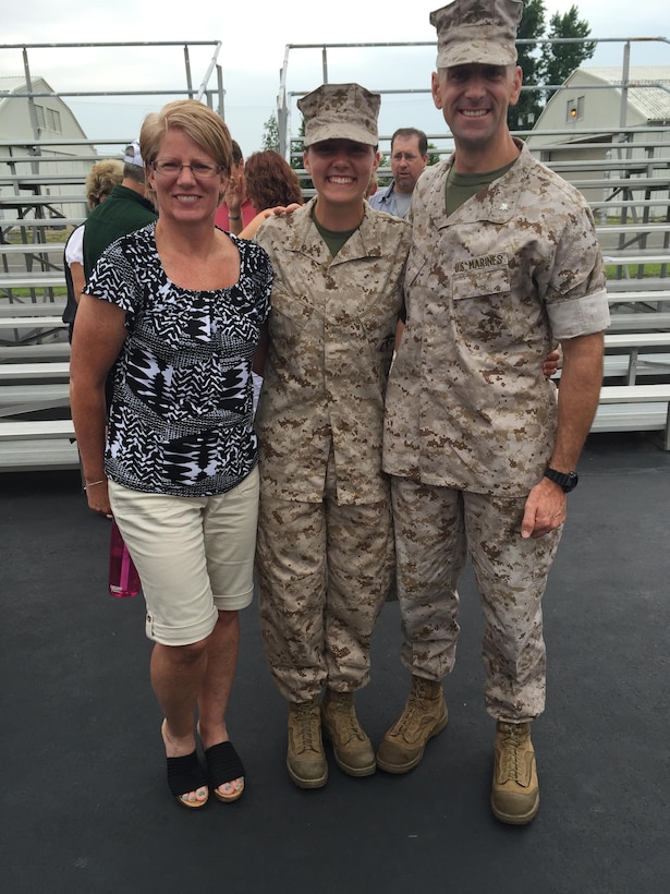 Candidate Elaine Lewis, center, poses with her parents during liberty at Marine Corps Officer Candidates School in Quantico, Virginia. Lewis, a 22-year-old native of Stafford, Virginia, is a senior at Virginia Tech and will graduate college May 12, 2017, and commission as a second lieutenant in the Marine Corps May 13, 2017. (Photo courtesy of Elaine Lewis) 