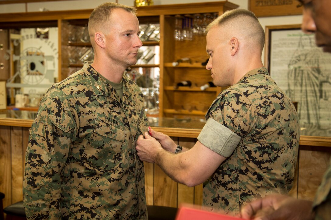 Maj. David J. Palka, assistant battalion inspector-instructor, 5th Battalion, 14th Marine Regiment, 4th Marine Division, is presented the Bronze Star with "V" device for valor during a Bronze Star Presentation on Camp Pendleton, Calif., May 1, 2017.  Maj. Palka received the Bronze Star for heroic service in connection with combat operations against the enemy while serving as a Commander, Battery E, Battalion Landing Team, 2nd Battalion 6th Marine Regiment, 26th Marine Expeditionary Unit, in support of Operation Inherent Resolve from 12 March to 25 May 2016. (U.S. Marine Corps Photo by Cpl. Brandon Martinez)