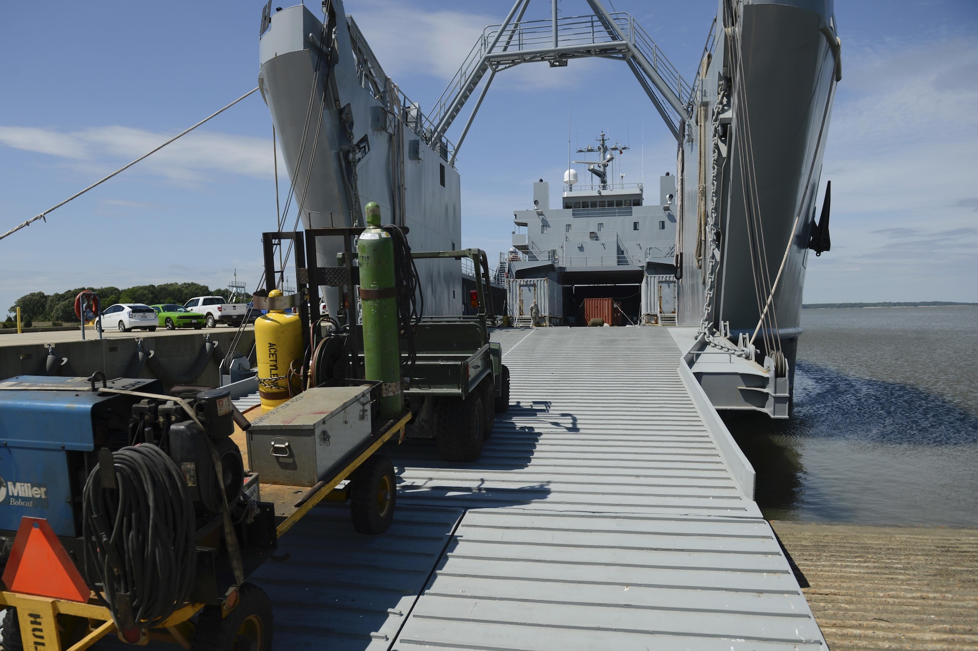 U.S. Army 558th Transportation Company, 10th Battalion, 7th Transportation Brigade (Expeditionary) allied trade specialist prepare to load their welding equipment onto the General Frank S. Besson Jr. Logistics Support Vessel at Joint Base Langley-Eustis, Va., May 4, 2017. The brigade’s welding shop is responsible for long-lasting repairs of Third Port’s vessels. (U.S. Air Force photo/Airman 1st Class Kaylee Dubois)