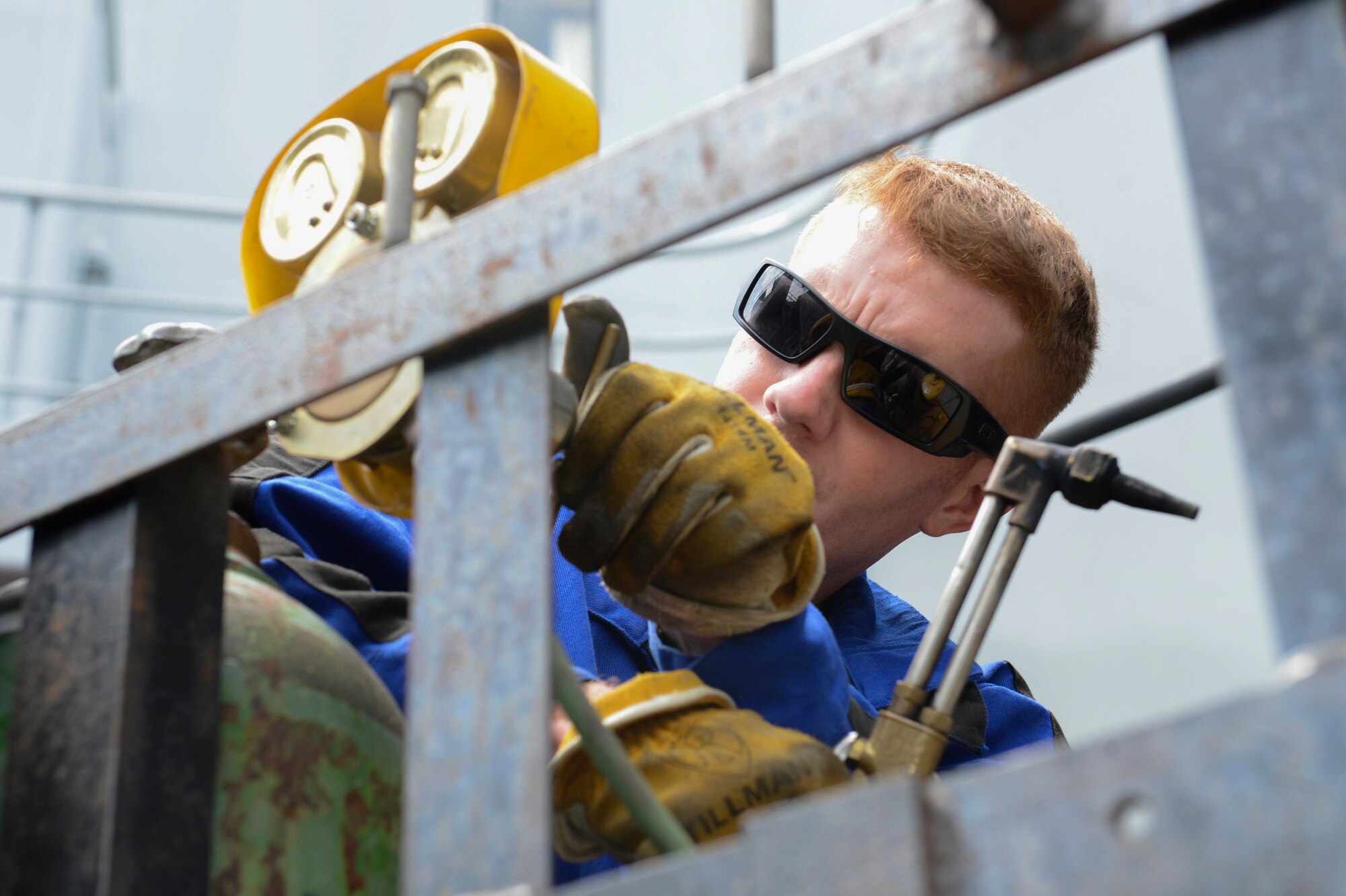 U.S. Army Staff Sgt. Jessy Kingrey, 558th Transportation Company, 10th Battalion, 7th Transportation Brigade (Expeditionary) welding shop maintenance control sergeant, prepares a welding torch for use at Joint Base Langley-Eustis, Va., May 4, 2017. The 558th Trans. Co. welding shop saves the Army money by not having to contract out their repair needs to the civilian sector. (U.S. Air Force photo/Airman 1st Class Kaylee Dubois)