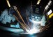 Airman 1st Class Joshua Roth, right, an 86th Maintenance Squadron aircraft metals technology technician, uses a metal insert gas welder while Staff Sgt. Brandon Didonato, also an 86th MXS aircraft metals technology technician, observes at Ramstein Air Base, Germany, May 2, 2017. Airmen assigned to the aircraft metals technology shop use a MIG welder to create sturdy aircraft parts on demand, allowing aircraft repair and maintenance to continue in a timely manner. (U.S. Air Force photo/Senior Airman Elizabeth Baker)