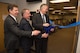 Glen Townsend, left, Engineering director for the Command, Control, Communications, Intelligence and Networks Directorate, Stephen Falcone Engineering Director for the Battle Management Directorate and Dennis Miller, AFLCMC-Hanscom’s director of Engineering and Technical Management, officially open the Hanscom Engineering and Analysis Training Lab in the Hanscom Collaboration and Innovation Center May 1, 2017. The HEAT lab will give Airmen access to advanced networked computers loaded with high-end software. (U.S. Air Force photo by Jerry Saslav)