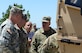 U.S. Army Gen. David Perkins, commanding general, U.S. Army Training and Doctrine Command, and Maj. Gen. Bo Dyess, Army Capabilities Integration Center director, are briefed by Col. Shane Fullmer, JLTV joint project manager on a production model Joint Light Tactical Vehicle at Joint Base Langley-Eustis, Va., May 2, 2017. The JLTV program is an Army-led agenda collaborating with the U.S. Marine Corps to replace a portion of each branch's light tactical vehicle fleets.  (U.S. Air Force photo/Staff Sgt. Teresa J. Cleveland)
