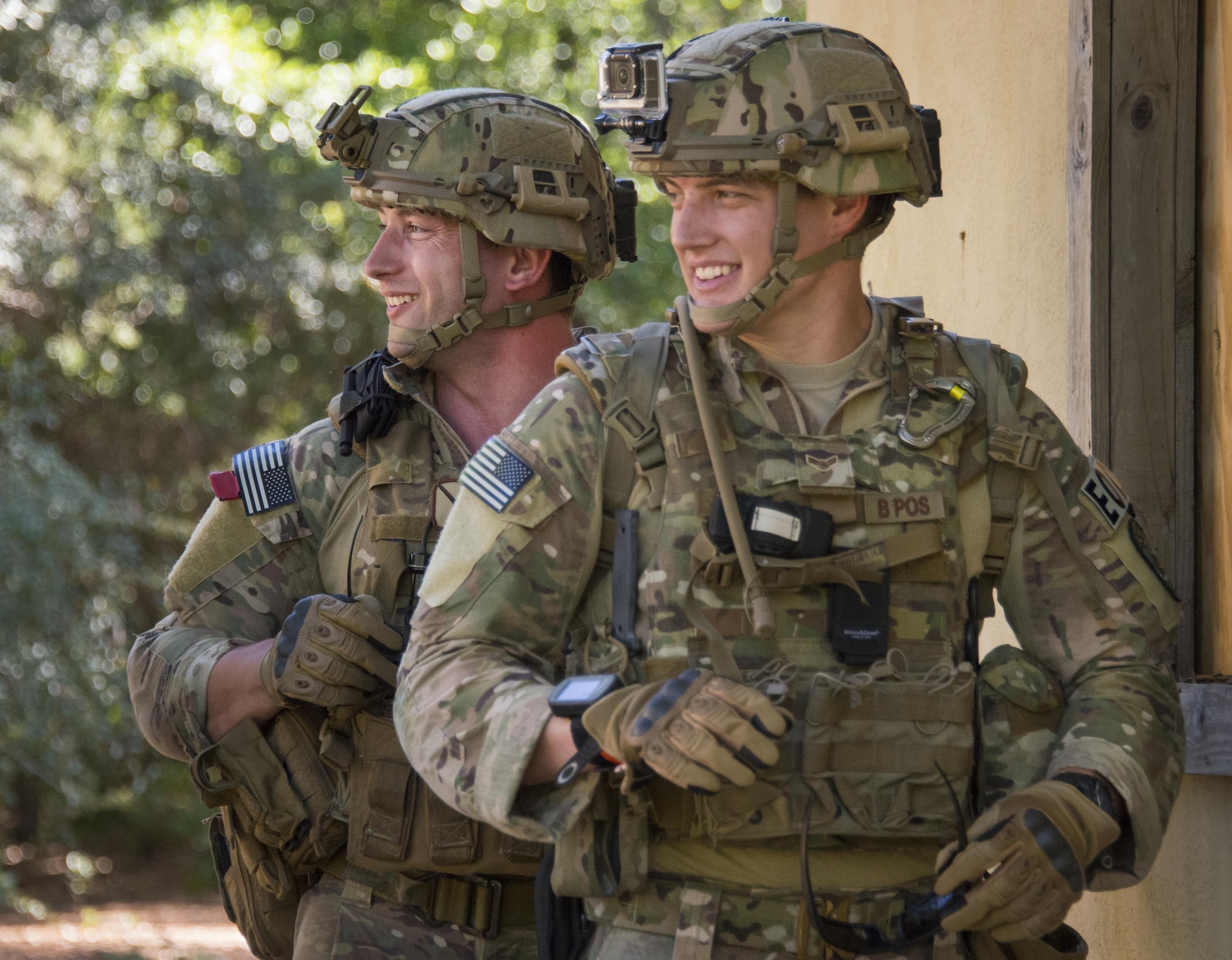 Airman 1st Class Zachary Pennington and Staff Sgt. Lee Cundiff, 31st Civil Engineer Squadron, Explosive Ordnance Disposal Flight, Aviano Air Base, Italy, receive their scenario briefing before clearing a large compound at Eglin Air Force Base, Fla., May 2. The team from Aviano were just one of the 17 teams here representing nine major commands in the EOD Warfighter Challenge. (U.S. Air Force photo/Cheryl Sawyers)