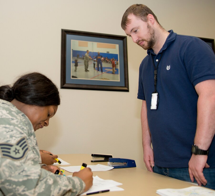 Daniel Zimmer, client systems technician, 913th Force Support Squadron, signs in for the Individual Ready Reserves (IRR) Muster May 5, 2017, at Little Rock Air Force Base, Ark. Zimmer, who was an active duty Airman with the 19th Airlift Wing, now works as a civilian for the 913th Airlift Group and updated his records during the mandatory event. (U.S. Air Force photo by Master Sgt. Jeff Walston/Released)