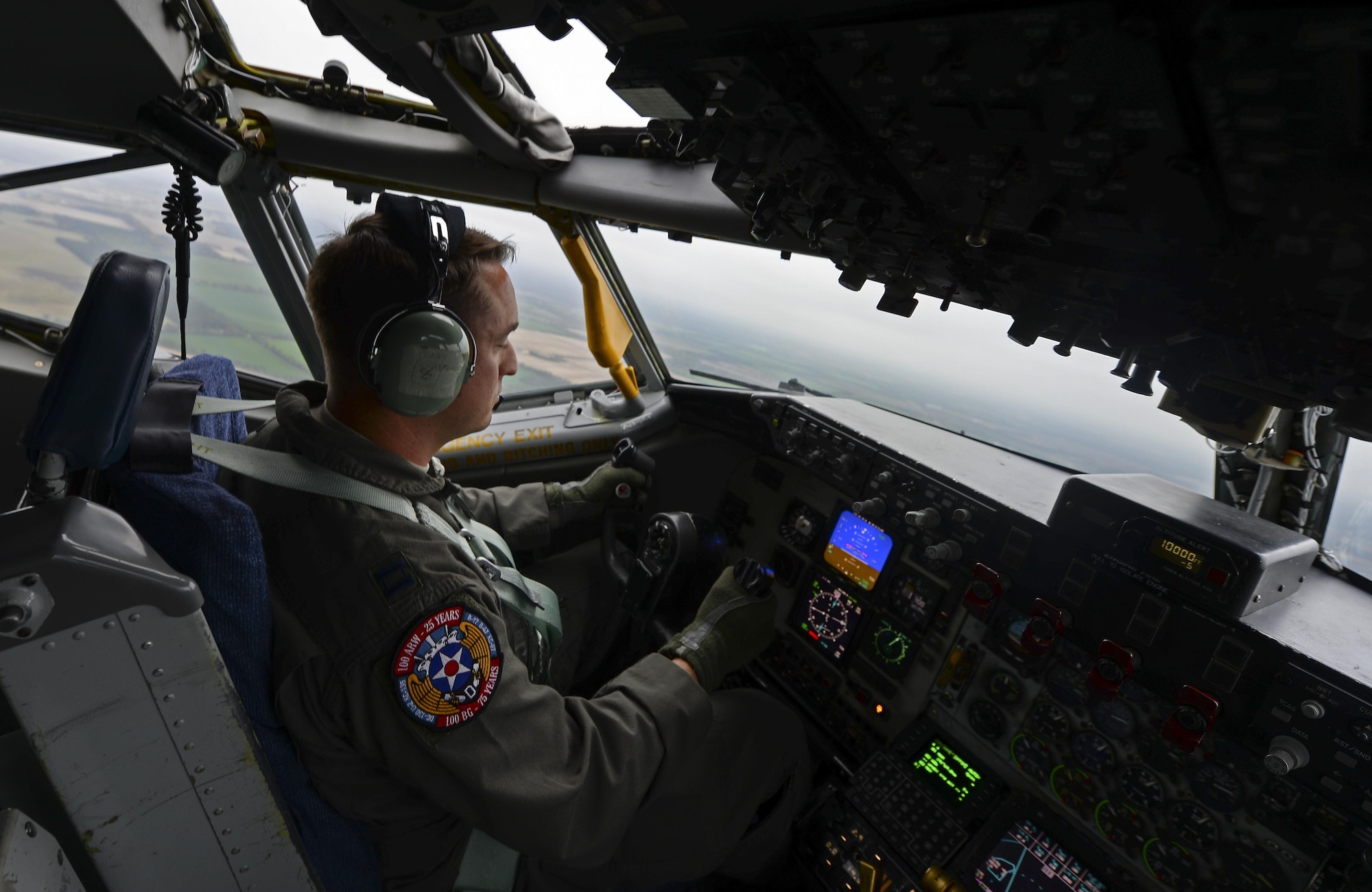 U.S. Air Force Capt. Bobby Stanford, 351st Air Refueling Squadron mission commander, flies a KC-135 Stratotanker May 3, 2017, over RAF Mildenhall, England. As the mission commander Stanford was in charge of two other aircraft during the refueling mission. (U.S. Air Force photo by Staff Sgt. Micaiah Anthony)